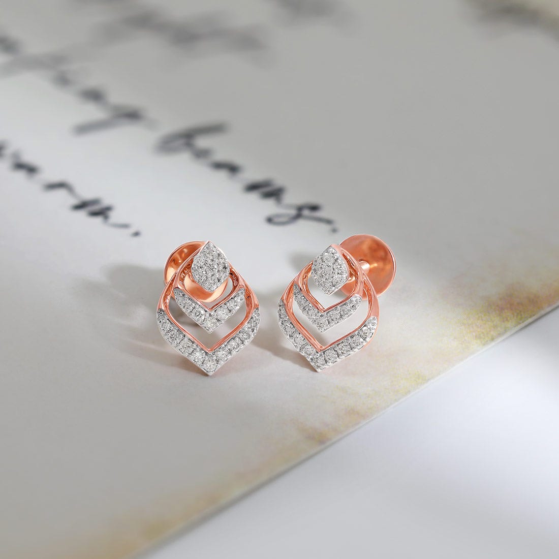 Layered Geometric Diamond Stud Earrings in 18K Rose Gold | Modern Luxury